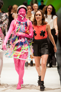 Katrina Caraboolad (Left) and designer Lailee Waxman (right) strut down the runway during the show's finale.