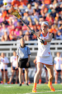Webster swings the ball around the perimeter. The senior netted a goal and notched a draw control in SU's victory.