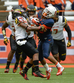Prince-Tyson Gulley collides with a Maryland defender during the Orange's 34-20 loss in the Carrier Dome Saturday. Gulley ran for 139 yards on 14 carries.