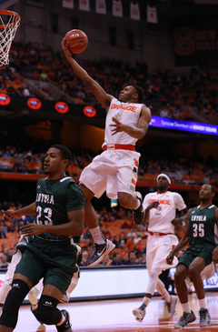 Patterson goes for a layup during the Orange's win.