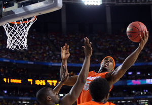 C.J. Fair attempts a layup in Syracuse's 61-56 loss to Michigan in the NCAA Tournament semifinals on Saturday. Fair went 9-of-20 from the field and finished the game with 22 points. 