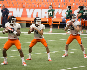 Freshman AJ Long (center) is competing with Mitch Kimble (right) and Austin Wilson for the backup quarterback job behind Terrel Hunt (left), but Long still has his sights set on one day starting for Syracuse.