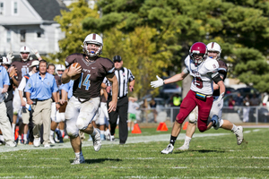 Zack Trause carries the ball downfield against Bates on Saturday. Trause and Tufts have won two straight games after losing 31 consecutive contests. 