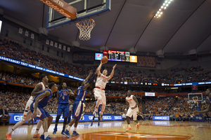 Trevor Cooney elevates for a one-handed floater in the lane. His 25 points and late-game poise led Syracuse to a narrow 71-69 victory over Louisiana Tech on Sunday.
