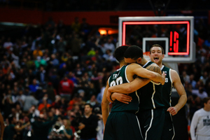 Michigan State celebrates it's win over Oklahoma on Friday. Two days later, the Spartans advanced to the Final Four after defeating Louisville in overtime. 