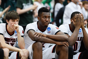 Louisville freshman forward Chinanu Onuaku  (center) looks on during the Cardinals' overtime loss to Michigan State in the Elite Eight on Sunday.