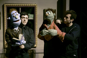 (From left) Stephen Gordon and Cole Francun perform with puppets during Syracuse University's Department of Drama's production of “Avenue Q.” The dark comedy left the audience in laughter.  