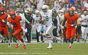 USF's Tyre McCants breaks free for a long run at the end of the first quarter.