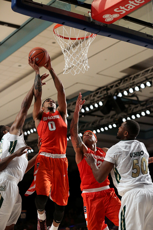 Michael Gbinije finished with 26 points and three rebounds against Charlotte on Wednesday. The Orange won 83-70.