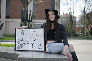 The University Scholar plans to stay committed to English and drawing comics after graduation.