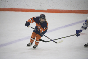 Allie Munroe's new, quicker shot has helped her fire off more pucks toward the net this season.