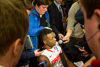 Grant addresses a crowd of reporters after fouling out in the game's closing minutes. 