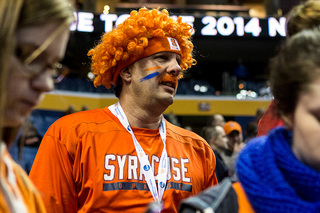An SU fan waits patiently for tipoff.