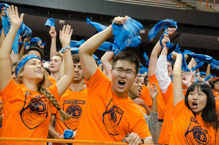 Zhang Haiyue, an undecided freshmen cheers with Flint Hall residents during the annual Home to the Dome event on August 21, 2014.