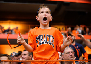 A young Syracuse fan screams in the stands during SU's 34-20 loss to Maryland Saturday.