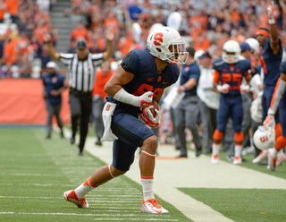 Jarrod West runs toward the Syracuse sideline. West caught three passes for 74 yards Saturday as SU lost to Maryland 34-20.