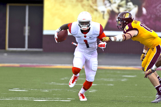 Syracuse's Ashton Broyld tries to elude Central Michigan defensive back Tony Annese and head downfield.