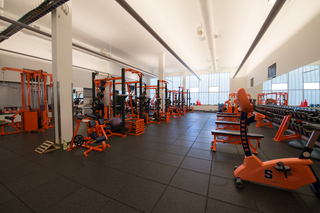 The weight room connected to the basketball courts is one of the three facilities that are accessible for student-athletes. 