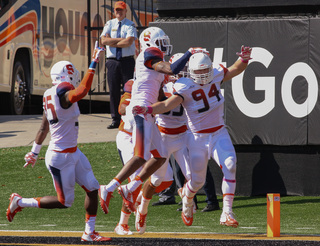 Robert Welsh celebrates his interception return for a touchdown. The SU defense accounted for two TDs on the day. 