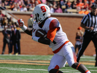 A Syracuse rusher cradles the ball in open space. The Orange had its best offensive day since Sept. 13.