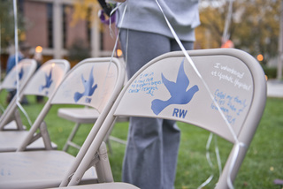 In honor of Remembrance Week, 35 chairs are set up on the Quad to represent the 35 SU students who were killed in the Pan Am Flight 103 bombing. The chairs are arranged to re-create where students sat on the plane.
