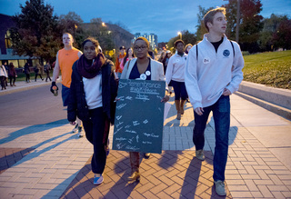 Remembrance Scholars and members of the SU community walked around campus in commemoration of Pan Am Flight 103 on Monday night as part of the Peace Walk event during Remembrance Week. 