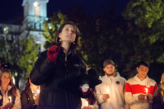 Tiffany Steinwert, dean of Hendricks Chapel, introduces the vigil by emphasizing the importance of remembering those who were lost in the bombing.