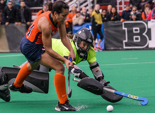 Hurff tries to slide a shot past Klein. Syracuse recorded six shots in the second half of Sunday's national championship game.
