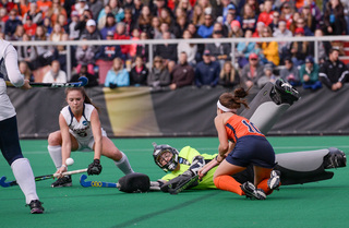 Brooks collides with Klein in Sunday's national championship game in College Park, Maryland. Klein made four saves in her shutout of the Orange.