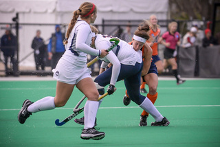 Brooks collides with a UConn defender. UConn’s defense was able to prevent the Orange from scoring at all during the national championship game.