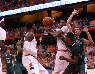 McCullough loses the ball as a trio of Loyola defenders converge.
