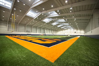 Syracuse's indoor practice facility features a full-length practice field and one set of goal posts.
