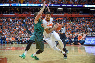 Gbinije tries to get into the paint. He finished just 3-of-8 from the field with three assists. 