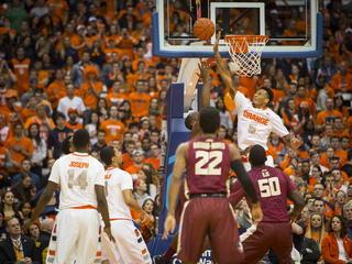 Freshman Chris McCullough swats a Seminoles shot at the rim. It was his lone block of the opening frame.