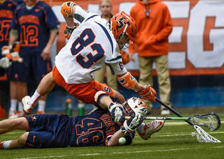 Ralph D'Agostino goes for a ground ball. The Orange picked up 31 of them, compared to 18 for the Cavaliers. 