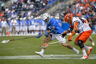 Staats scraps with a Duke pole for a ground ball.