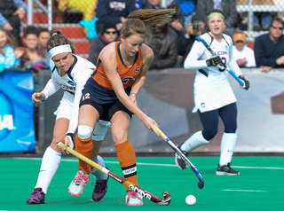 Emma Russell, who led Syracuse with 21 goals, fights for possession in the national championship. Syracuse dropped the title game to Connecticut, 1-0. 