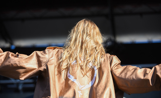 Tove Lo gets into her music as she flings her hair into her face. 