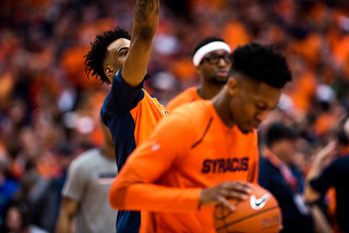 Syracuse players usually arrive to games about three or two hours before games, when they begin to warm up on their own. 