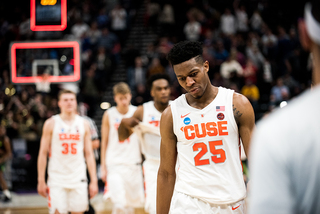 Syracuse players filed off the court and into the locker room for the final time this season, which SU ended with a 20-14 record. 